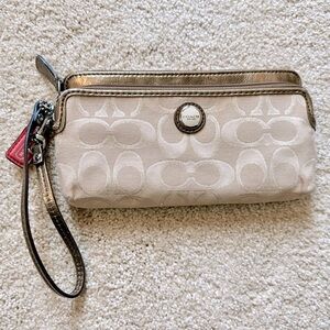 Authentic COACH wristlet wallet clutch. beige color